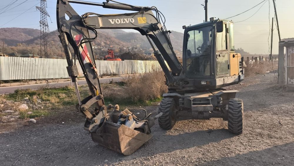 Услуга колесного мини-экскаватора