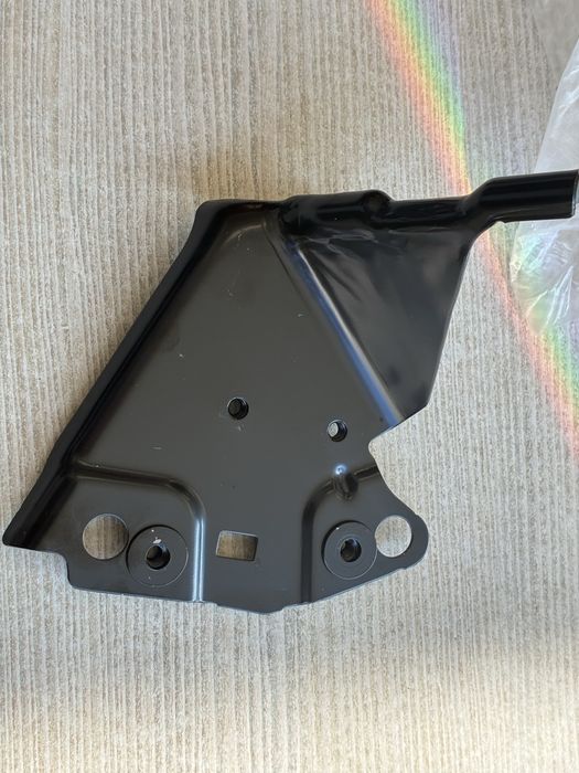 Държач на калник ЛЯВ за VW Tiguan 2021-