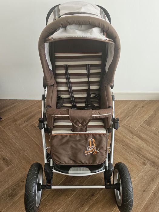 Детская коляска Baby Care.