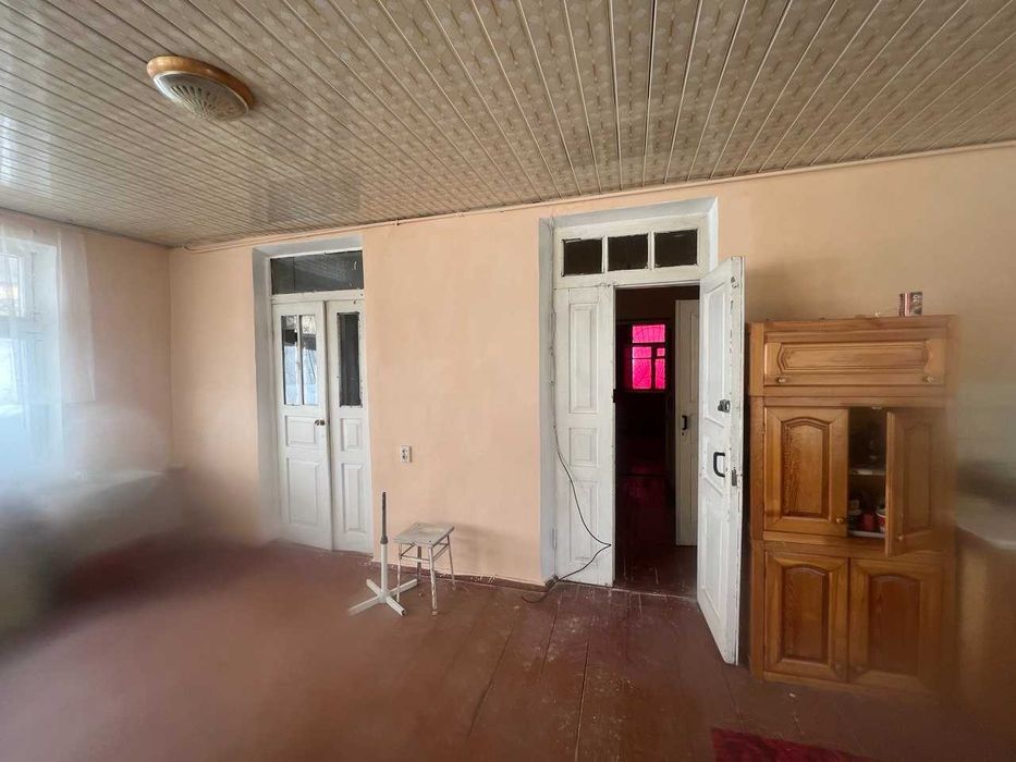 Дом в г. Янгиюле с участком