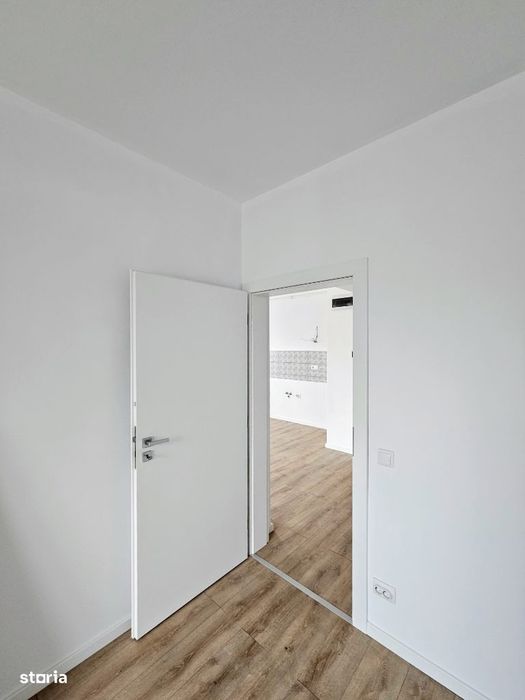 Ap. finisat la alb cu 2 camere, parcare exterioara, Magnolia Sibiu