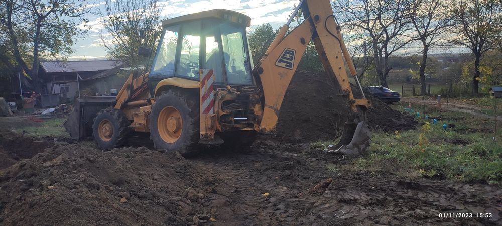 Buldoexcavator  camion excavator de inchiriat