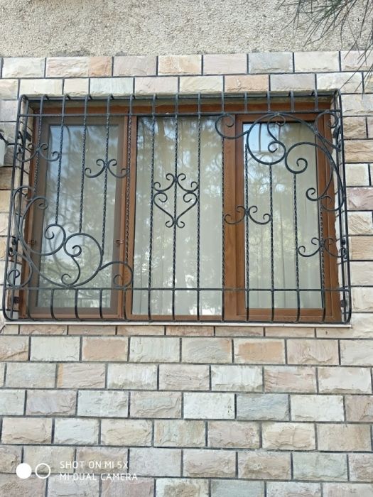 Решётки металлические двери