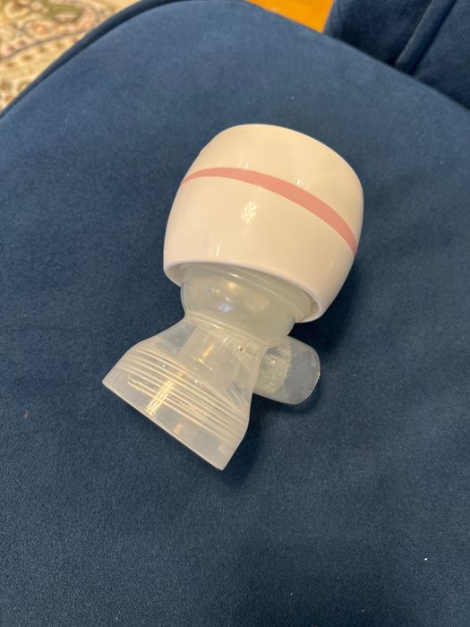 Электрический молокоотсос