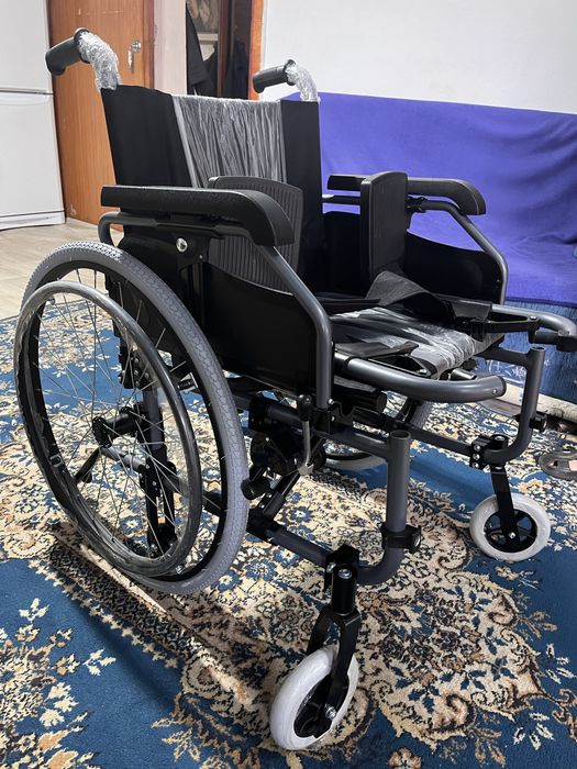 Инвалидная коляска