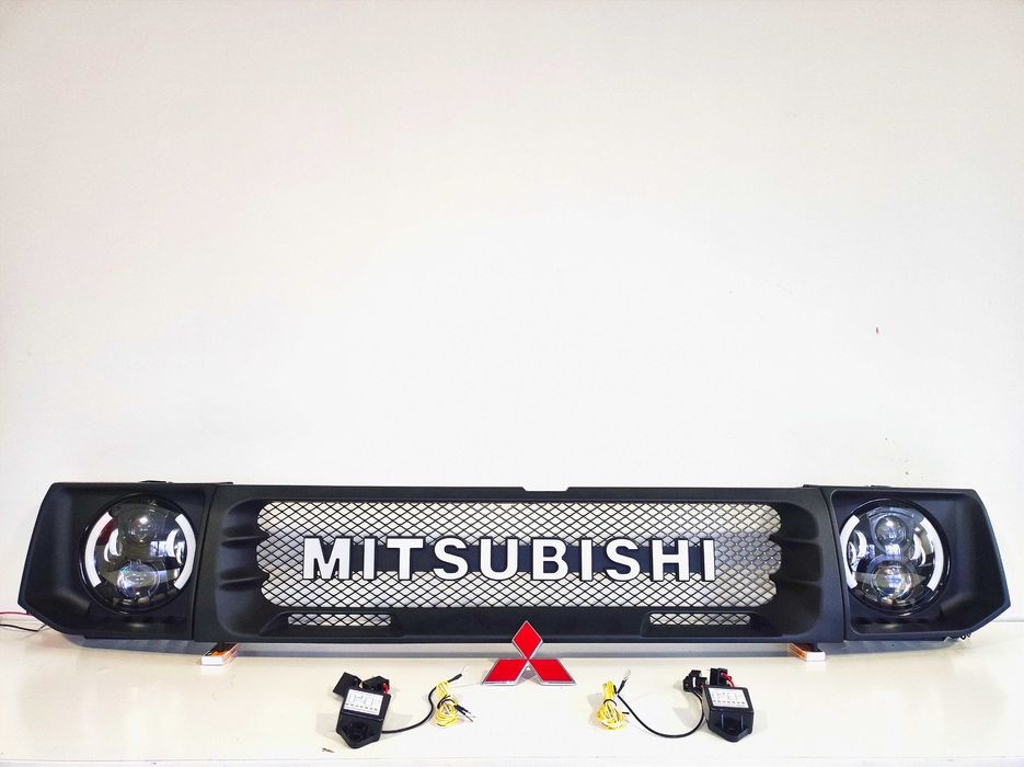 Комплект переделки bi led фары + решетка на Mitsubishi Pajero 2