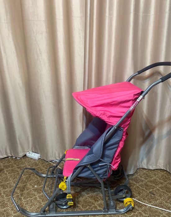 Санки с колёсиками.