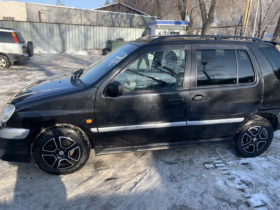 Тайота Раум 1997 года