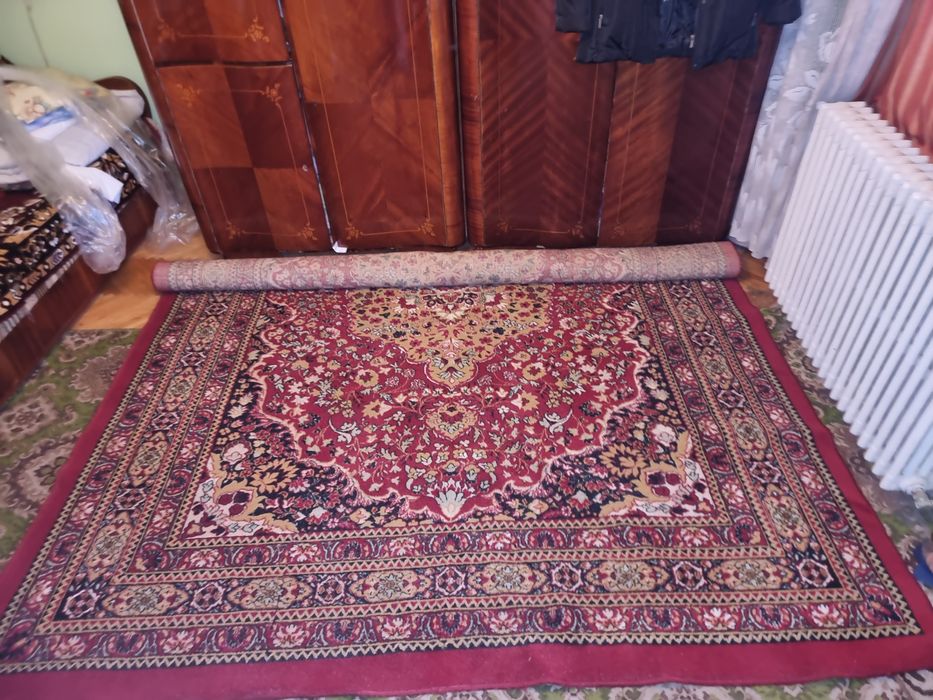 Covor din perjă in stare foarte buna