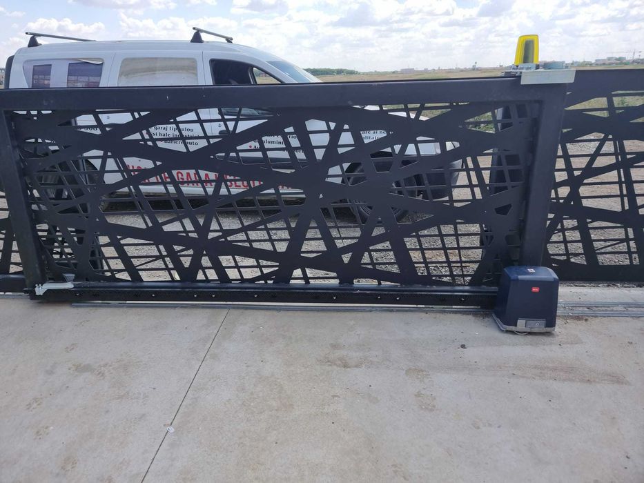 Usi de garaj sectionale,usi tip rulou ,automatizari-direct producator