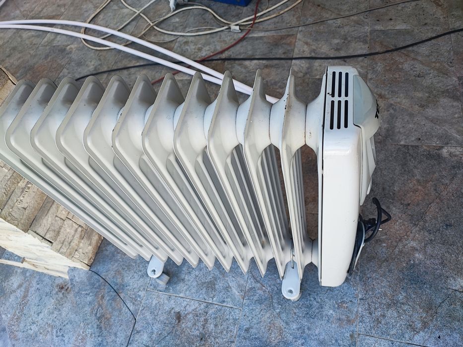 Calorifer electric ulei Tesy 2500W, 12 elementi, 2 trepte, termostat, perfect functional - ca nou!