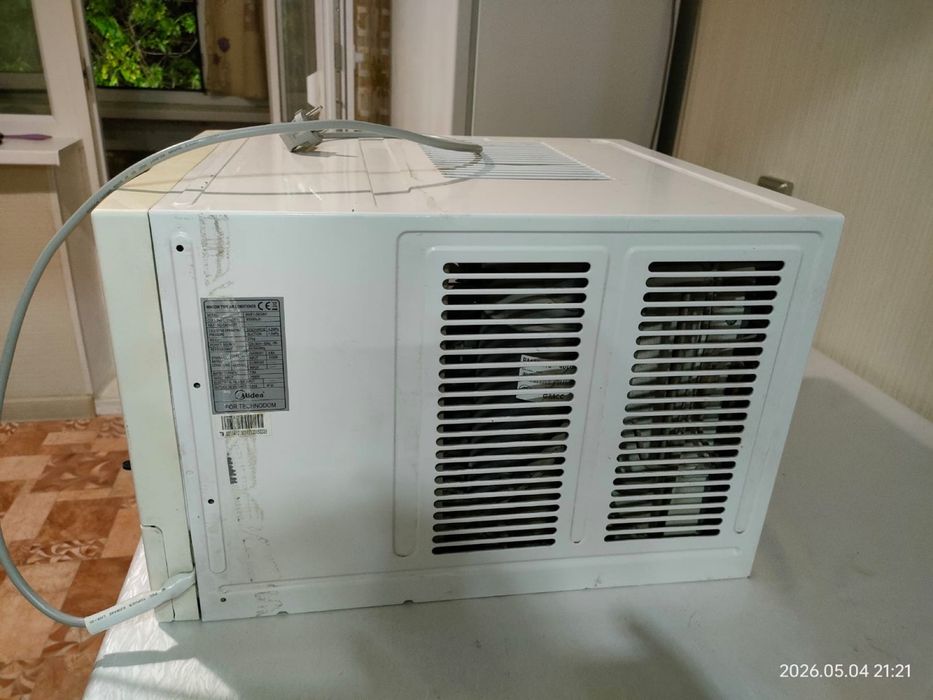 Оконный кондиционер “Midea”