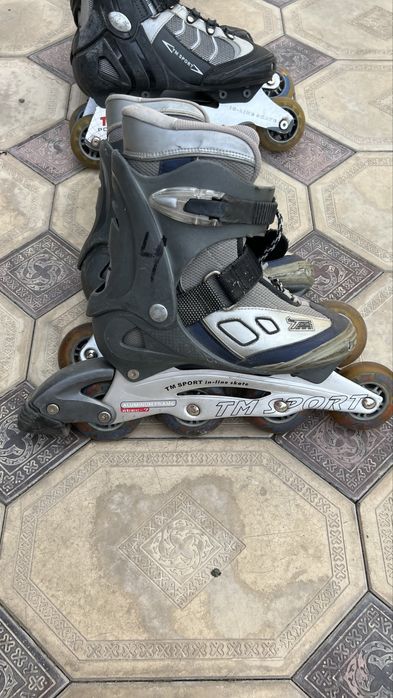 Роликовые коньки