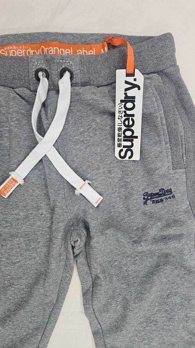Pantaloni bumbac dens Superdry  M / gri OFERTA