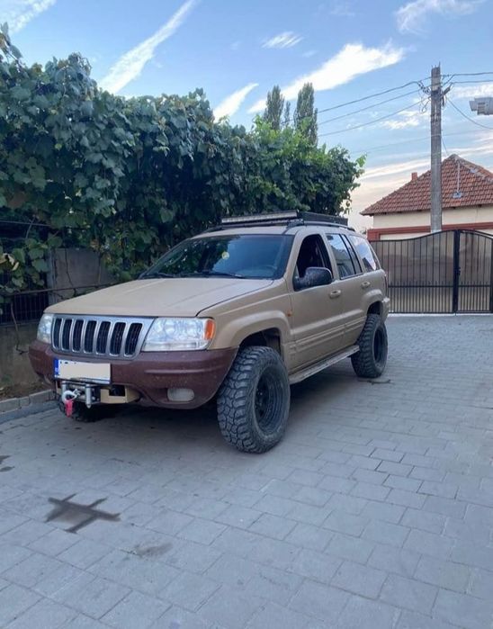Jeep Grand Cherokee cu troliu 6 tone pregatit offroad stare impecabila