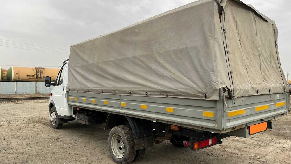 Газель  бортовой тентованный 330202