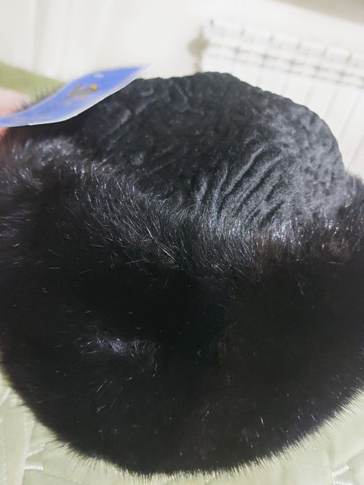 Продам зимию шапку