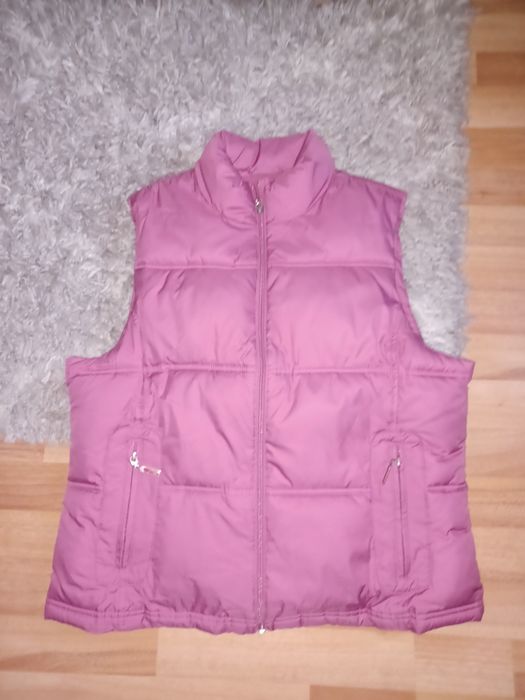 Vestă          .