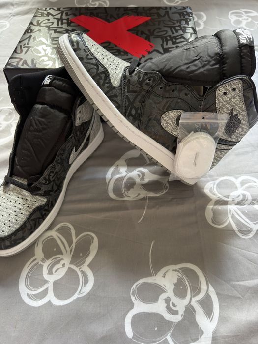 Adidasi Jordan 1 High Rebellionaire