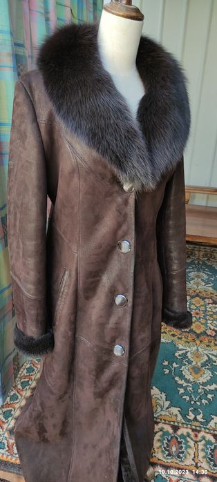 Женская дубленка.