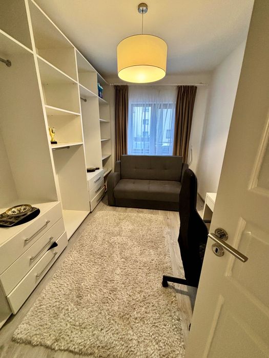 Închiriez apartament modern cu 3 camere și grădină privată, situat într-o zonă liniștită din Ghimbav - aproape de Brașov.