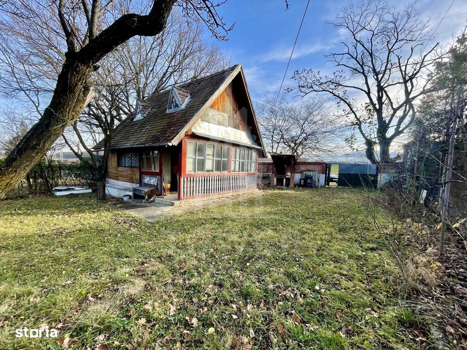 Teren intravilan 1.915 mp + cabană din lemn | Tocile – Sadu
