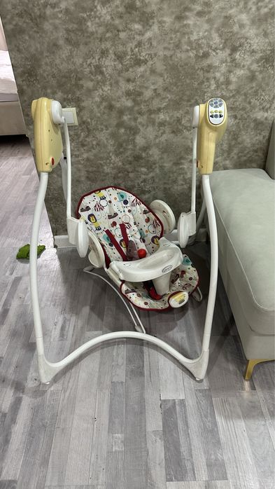 Детская электронная качеля Crago