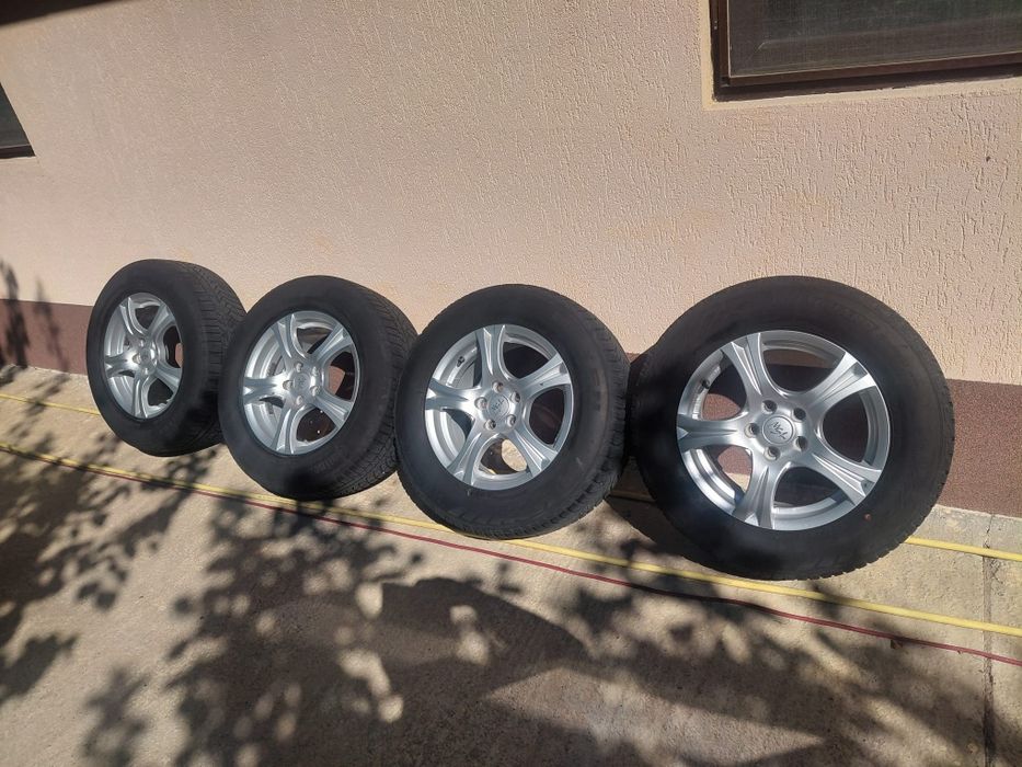 Jante cu anvelope all season ford kuga