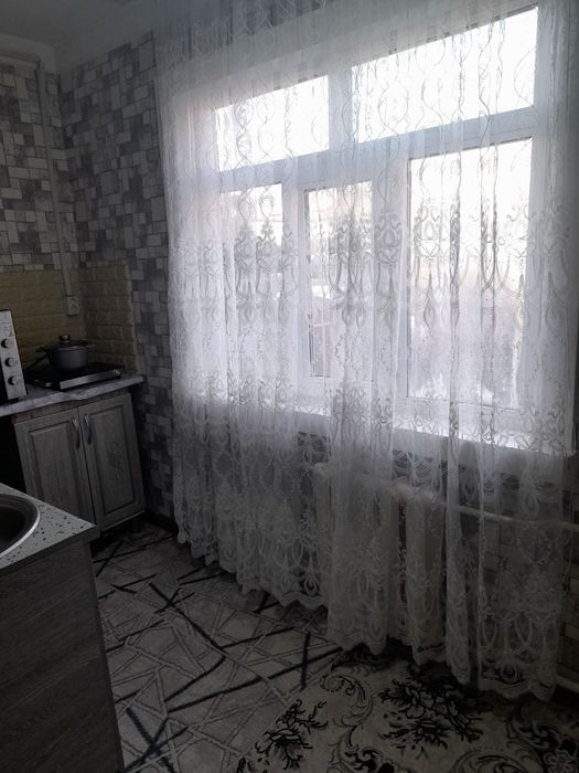 Продам 1 комнатную квартиру в спутнике 9 на 1 этаже с огородом