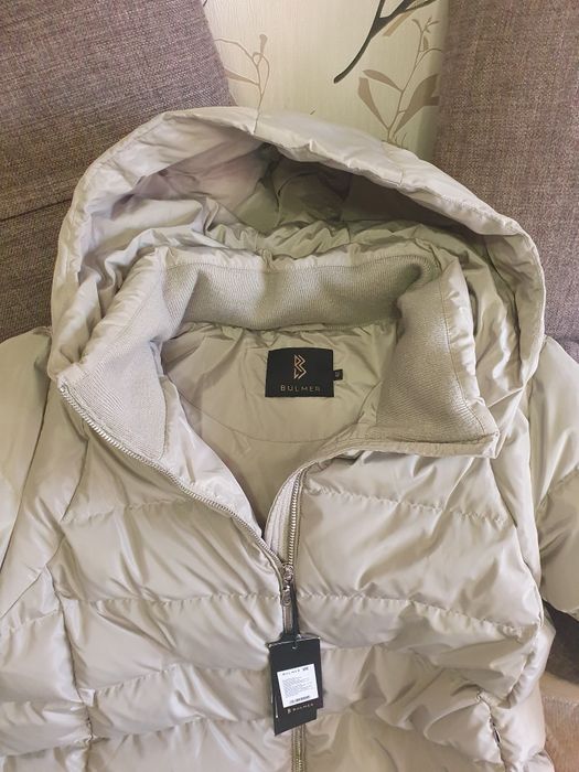 Продам пуховик новый