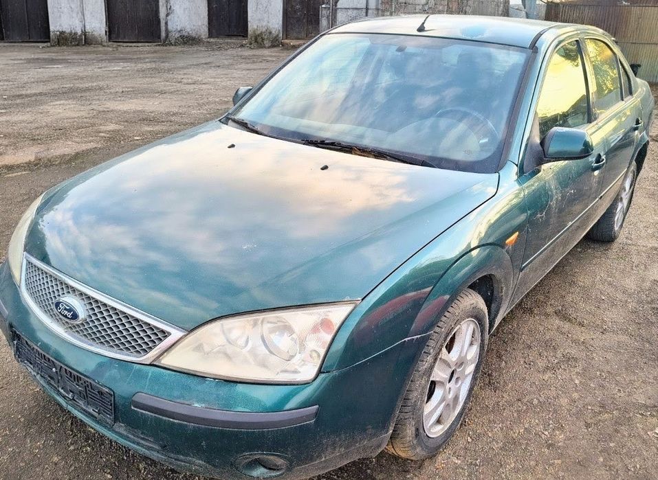 Ford Mondeo (2.0 diesel) - motor,cutie,cârlig,uși,bara,faruri,scaune