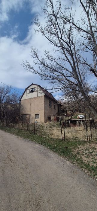 Участок земли с домом