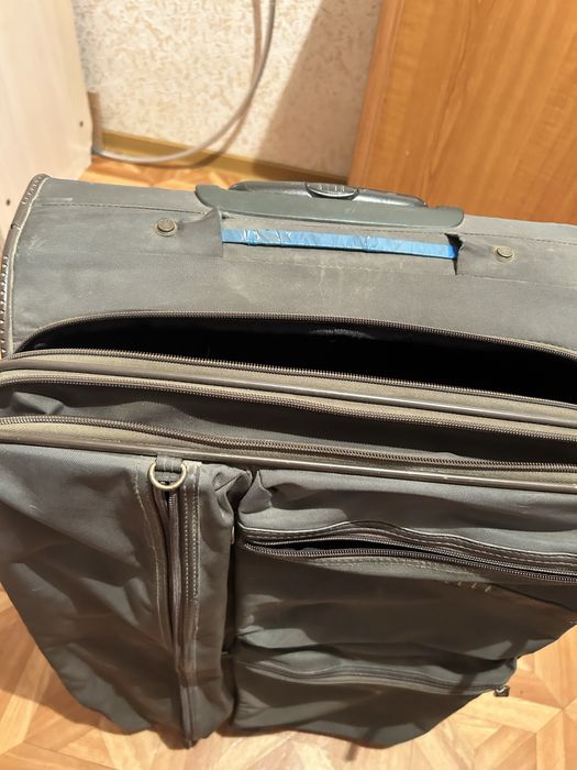 Отдам чемодан ( качественный )