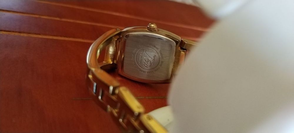 Позолоченные часы. США