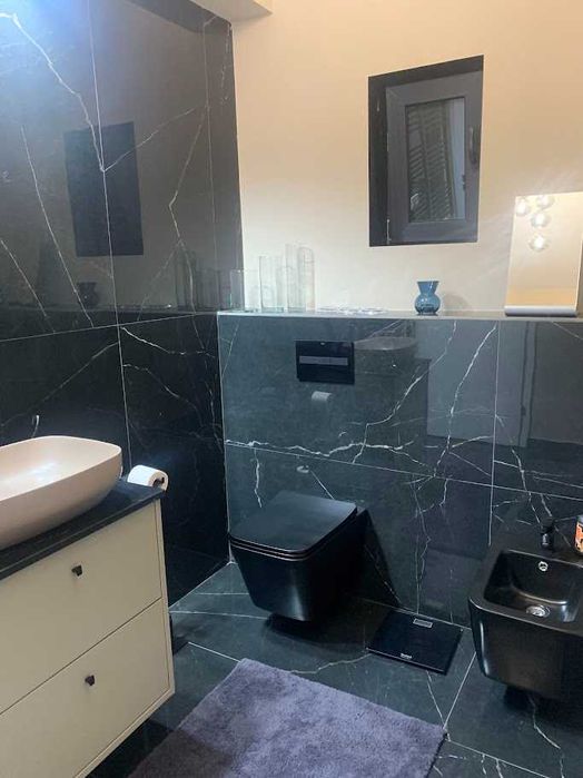 Vand casa Bragadiru 100mp P 4 camere 2 bai bucatarie deschisa 330mp teren toate utilitatile cu placa de beton deasupra