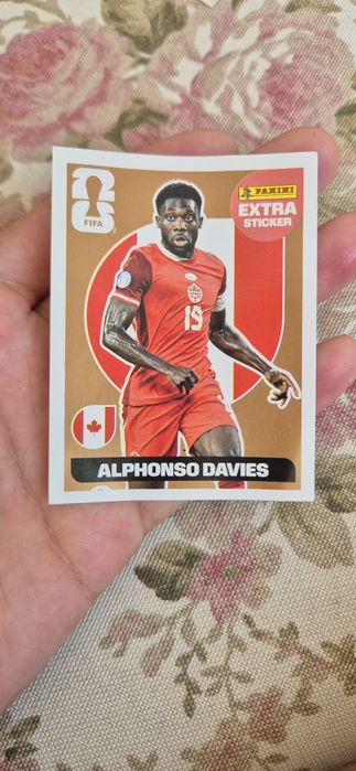 Alphonso Davies(extra sticker bronze card panini world cup 2026 collection)