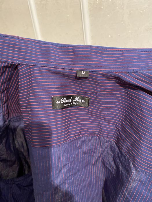 Продам рубашку в отличном состояние