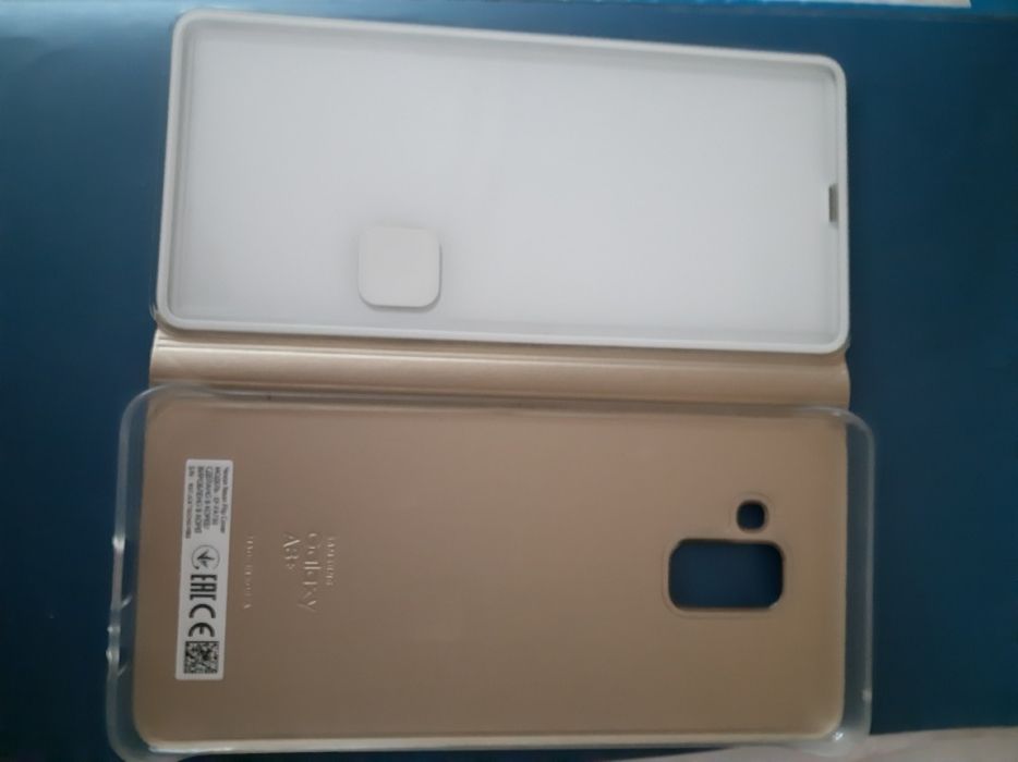 Продам чехол-книжку А8+ оригинал