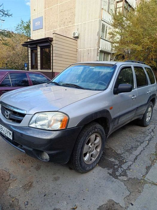 Продам Mazda Tribute 2003 г. Серебристый