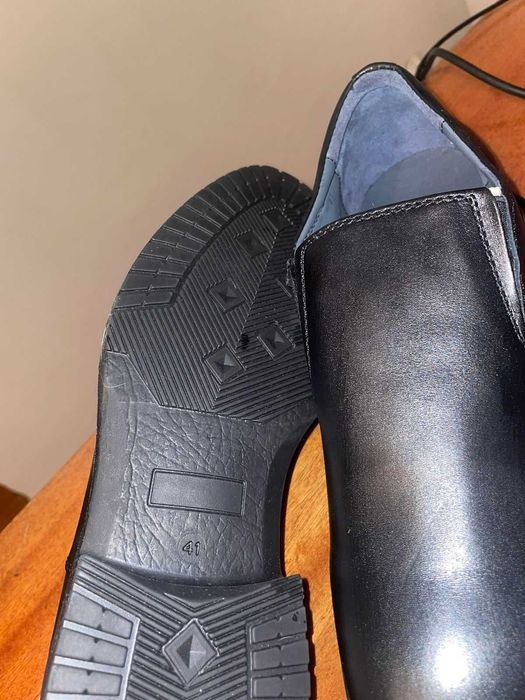 Новые мужские туфли