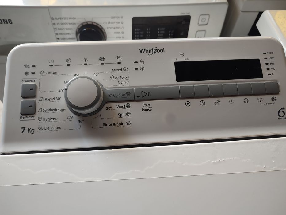 Vând masina de spălat verticala 390 Ron