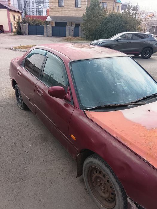 Продам мазда кронос.