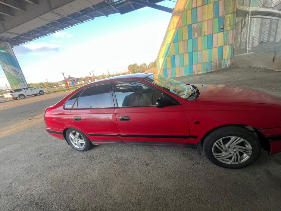 Тойота карина Е 1994
