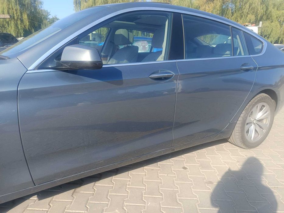 Usa dezechipata BMW Seria 5 GT 2010 ( Pret pe bucata )