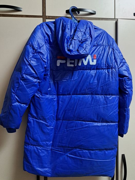 Куртка новая длина 84см.