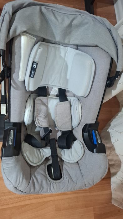 Продам кодяску + автокресло Doona +