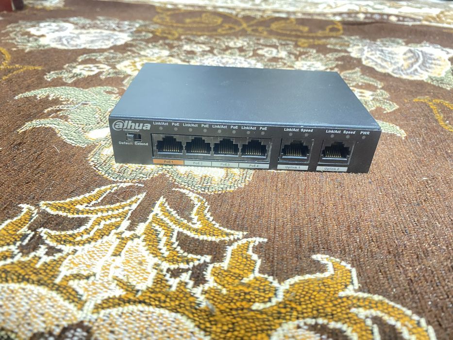 Каммутатор и видеокамера