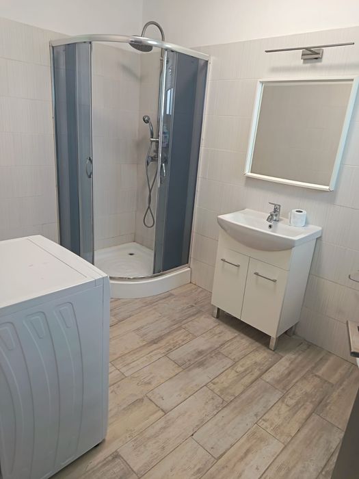 Apartament 2 camere utilat pe termen lung, bloc nou de 6 apartamente, la 7 km de București. Parc, teren minigolf, restaurant