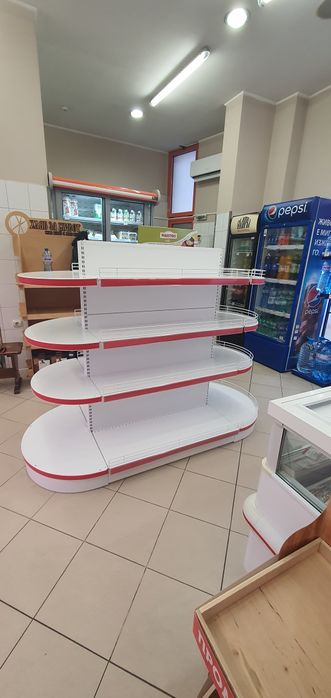 Заоблени рафтове за островен стелаж - гондола.