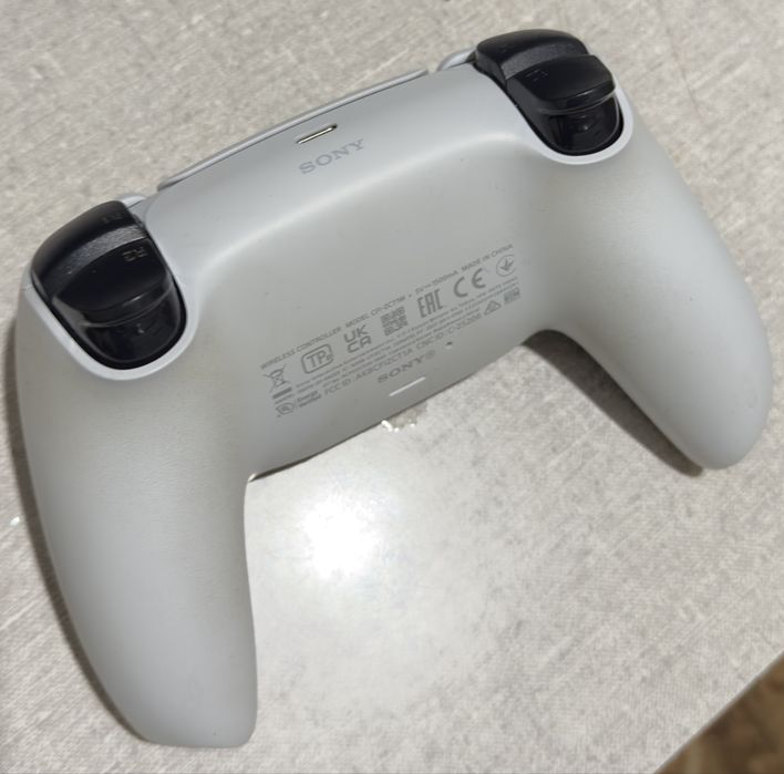 DualSense, White and Cosmic Red